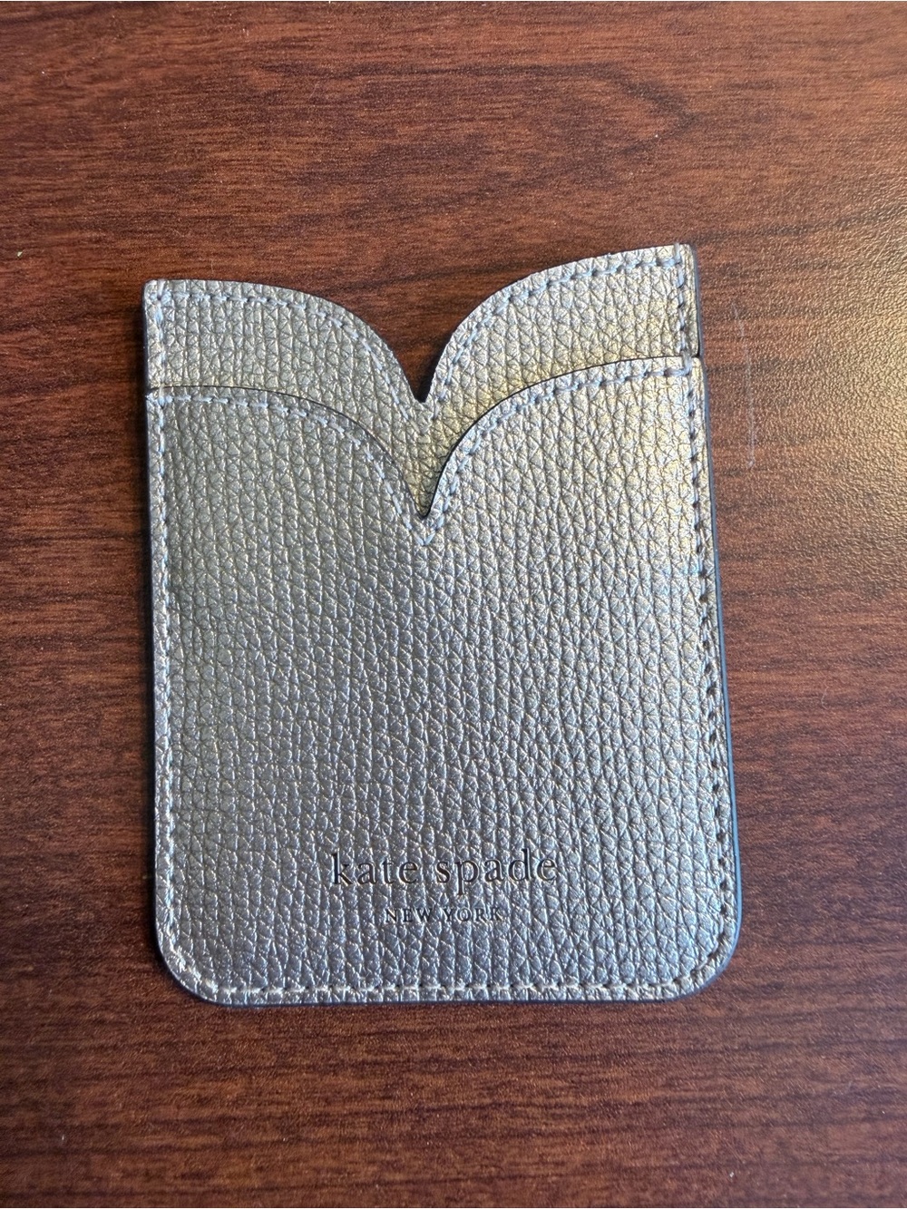 Title: Kate Spade Metallic Silver Leather Phone Sticker